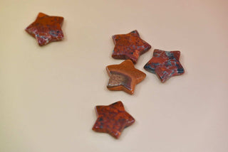 Crystal Gemstone Stars on pale orange background