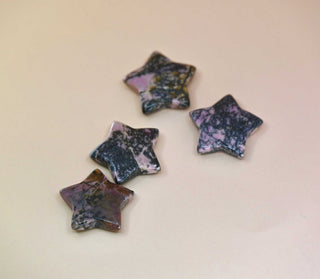 Crystal Gemstone Stars on pale orange background