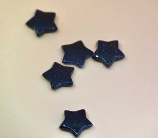 Crystal Gemstone Stars on pale orange background