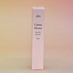 The box of the Cactus Flower 15ml Unisex Eau de Parfum Travel Sprayer on light pink background.