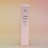 The box of the Cactus Flower 15ml Unisex Eau de Parfum Travel Sprayer on light pink background.