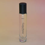 The Cactus Flower 15ml Unisex Eau de Parfum Travel Sprayer on light pink background.