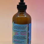 The back of the Coconut Kiss Body Cream Moisturizer bottle.