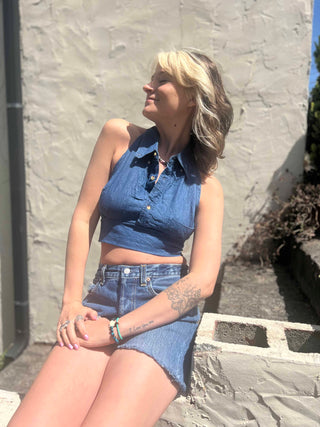 Recycled Denim Halter Top – Upcycled Vintage Shirt on a cream stucko background