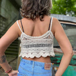 back view of boho embroidered crop top with floral stitching and scalloped edge 