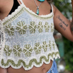 Open crochet lace front of boho crop tank top in ivory – model showing breathable fabric design with close up view of the flower pattern