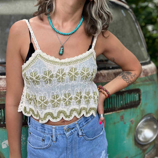 Open crochet lace front of boho crop tank top in ivory – model showing breathable fabric design.