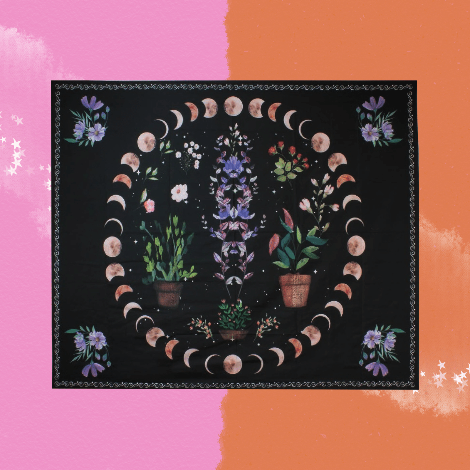 The Succulent Moon Phases Wall Tapestry on a pink and orange background.
