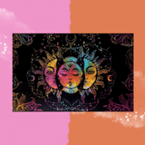 The Multi Tie Dye Triple Face Moon Cotton Tapestry on a pink and orange background.