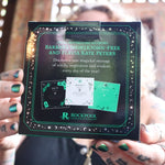 Someone holding the 2026 Witch's Calendar Daily Magick Day-to-Day Calendar, showing off the back.