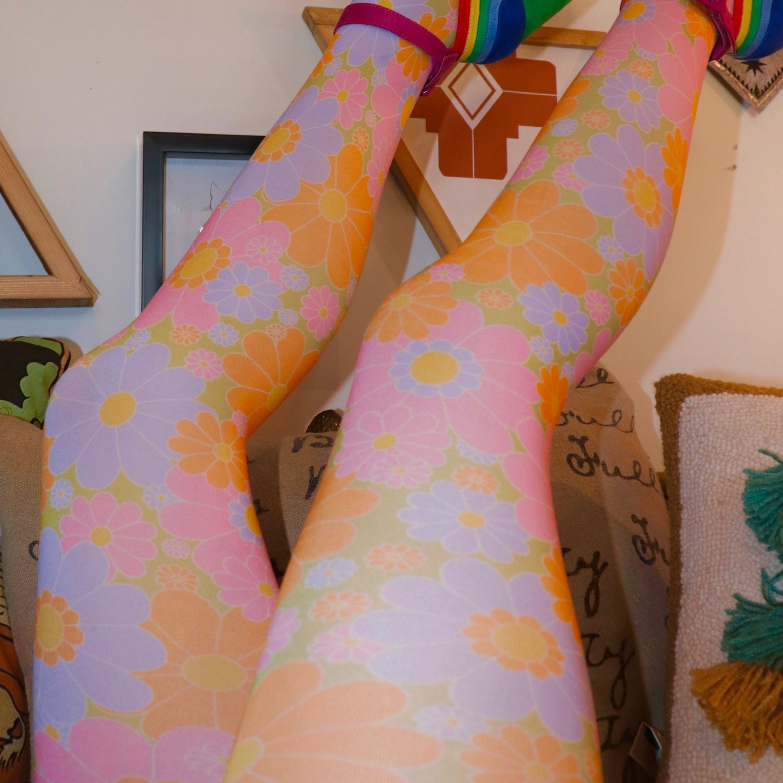 Someone wearing the Retro 1960s Pink & Green Flower Power Tights.