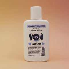 The Hippie Witch Body 4 oz Lotion on a pink and yellow background.