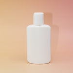The back of the Cedar Witch Goods 4 oz lotion bottle.