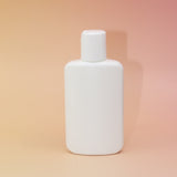 The back of the Cedar Witch Goods 4 oz lotion bottle.