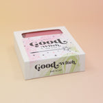 The Good Witch Wicked Themed 4 oz Bar Natural Soap on a pink and yellow background.