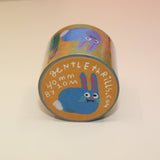 The Colorful Bunnies Washi Tape on a pink and yellow background.