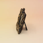 The Frog Mini Vintage Framed Print on a pink and yellow background.