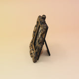 The Frog Mini Vintage Framed Print on a pink and yellow background.