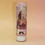 The Luminary Billie Altar Candle on a pink and yellow background.