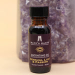 The Sensual Lust & Passion Reiki Charged Anointing Oil in front of an amethyst tower all on a pink and yellow background.