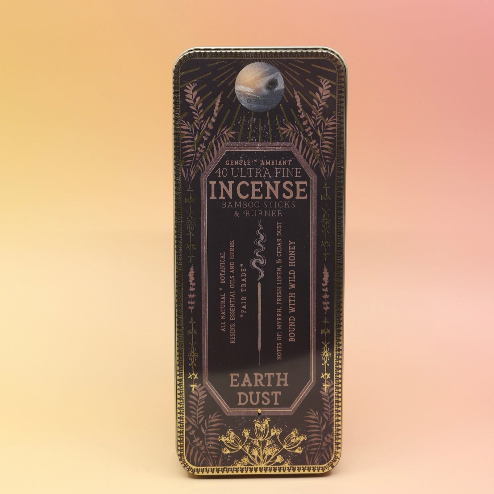 The Earth Dust Premium Incense on a pink and yellow background.