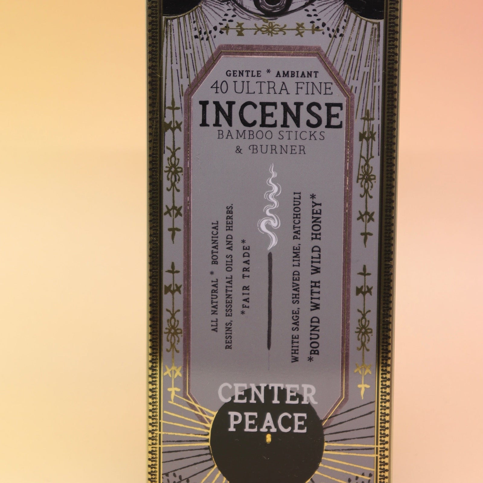 The Center Peace Premium Incense on a pink and yellow background.