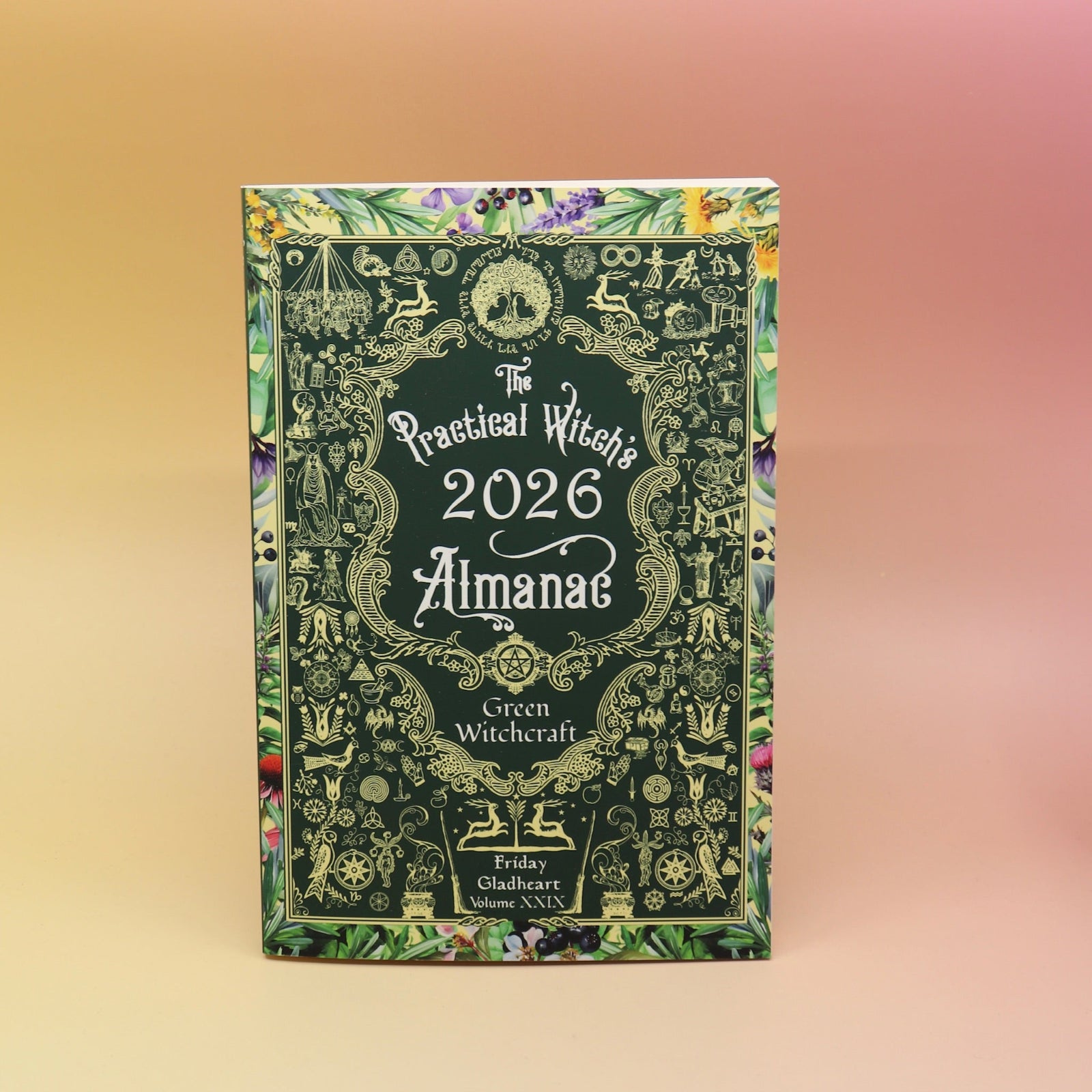 The Practical Witch's 2026 Almanac on a pink and yellow background.
