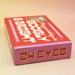 The side of the Googly & Bright Holiday Advent Calendar on a pink and yellow background.