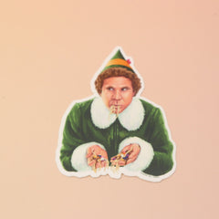 The Buddy the Elf Eating Spaghetti Sticker on a pink and yellow background.
