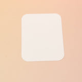 The Emotional Support Nuggets Vinyl Sticker on a pink and yellow background, showing off the back.