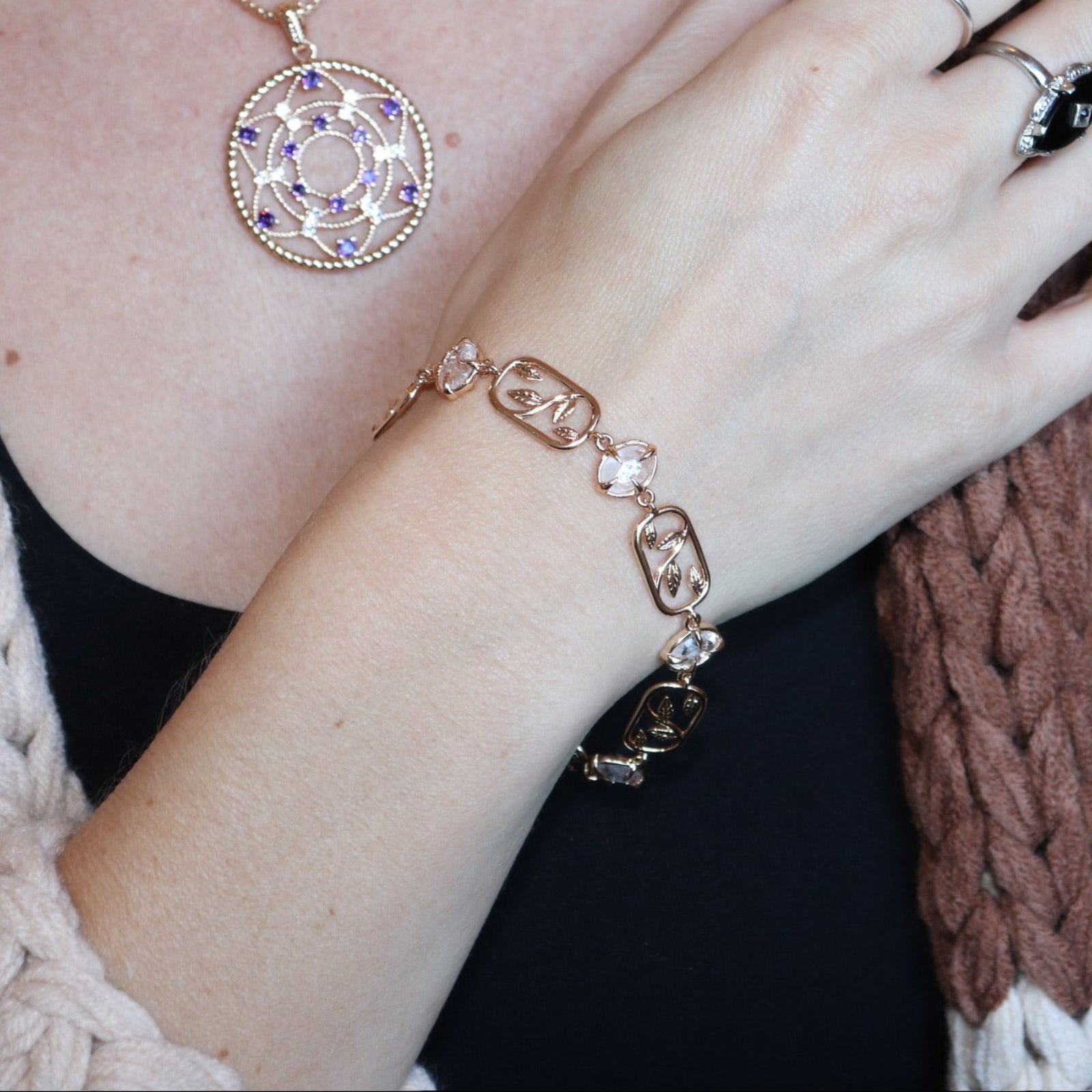 Someone wearing the Fae Crystal Gold Brass Bracelet.