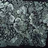 An up-close image of the Black Slime Mold Cotton Bandana.
