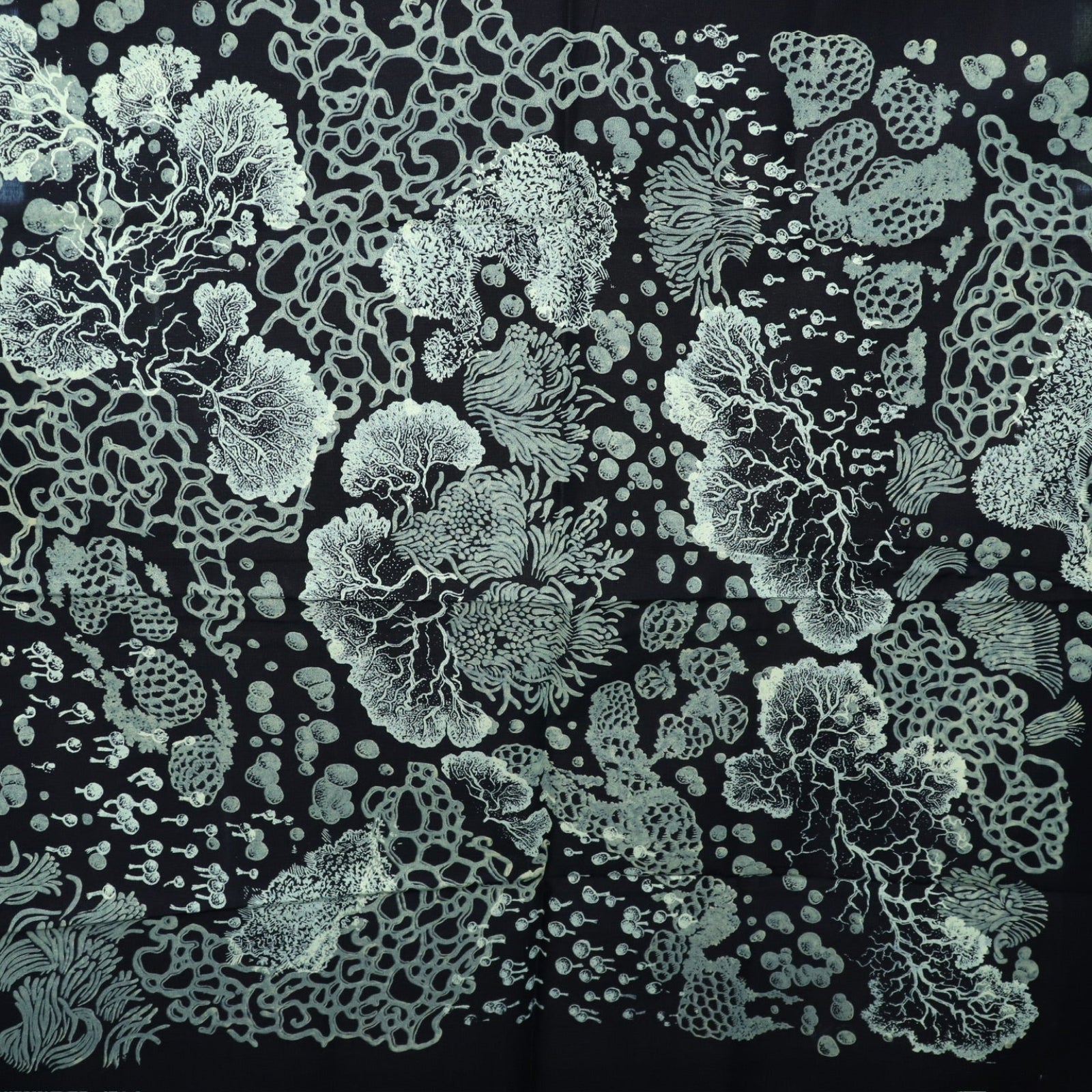 An up-close image of the Black Slime Mold Cotton Bandana.