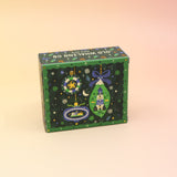 The Coastal Christmas Holiday Bar Soap on a pink and yellow background.