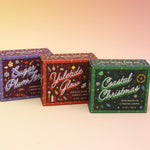 All of the Old Whaling Company Holiday Bar Soaps on a pink and yellow background.