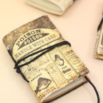 A Lotions & Potions Mini Journal on a pink and yellow background.