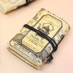 A Lotions & Potions Mini Journal on a pink and yellow background.