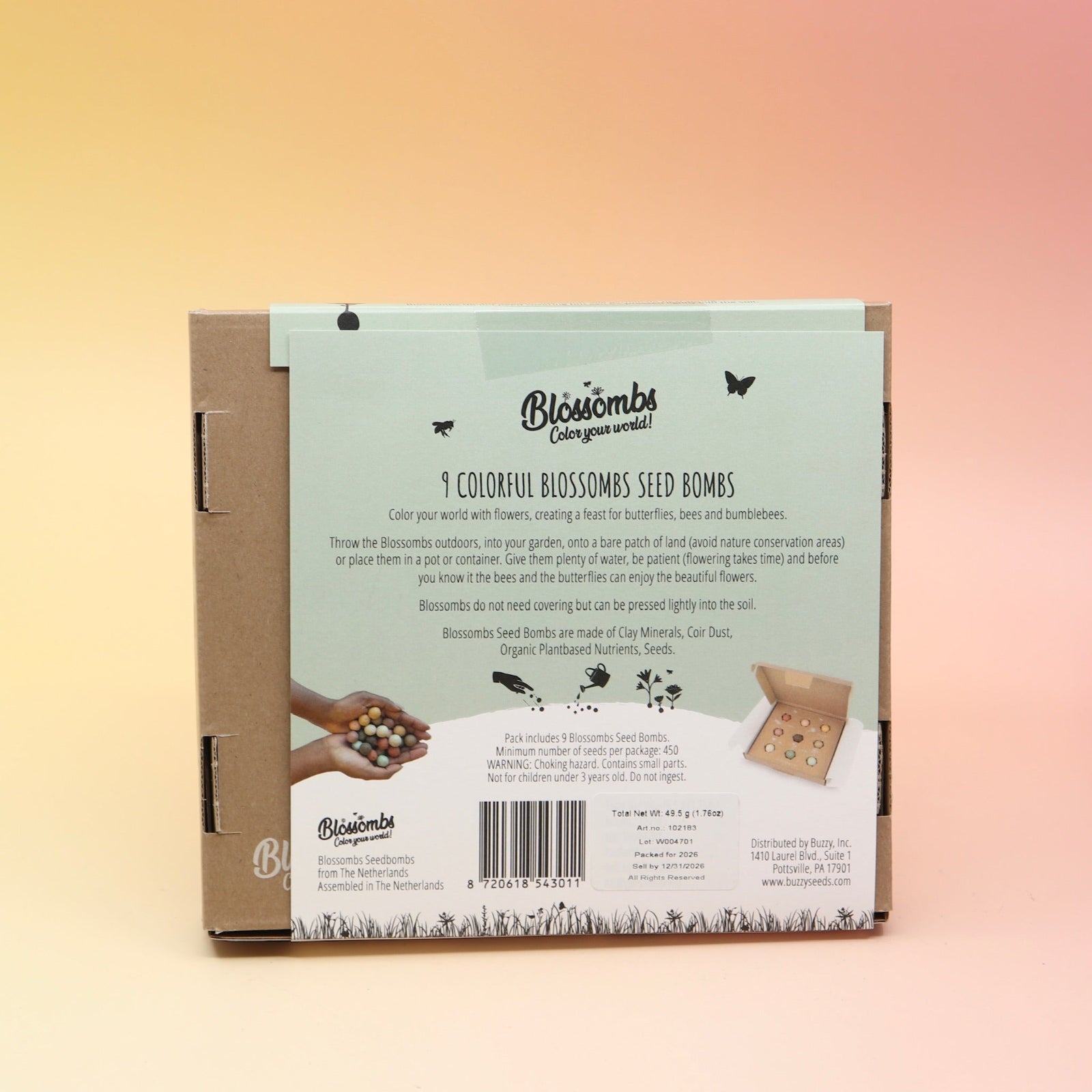 The back of the Colorful Xmas Wildflower Seed Bomb Balls Set on a pink and yellow background.