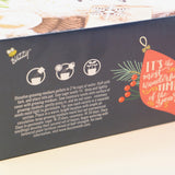 The back Holiday Hammered Windowsill Rosemary & Sage Growing Kit on a pink and yellow background.