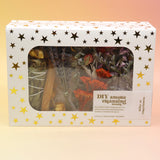 The DIY Smoke Cleansing Smudge Kit on a pink and yellow background.