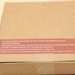 The Cleanse & Manifest Smudge Bundle Kit on a pink and yellow background, showing off the back.