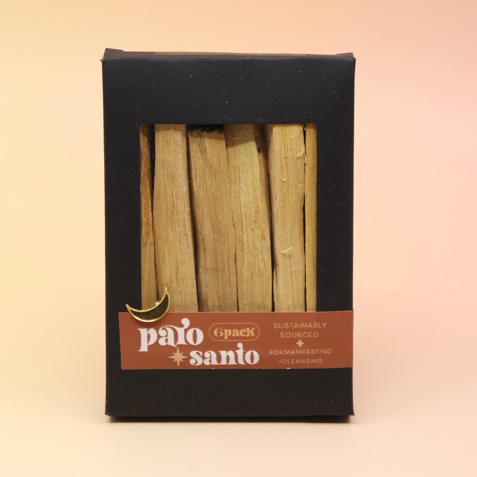 The 6 Pack Palo Santo Cleansing Bundle on a pink and yellow background.