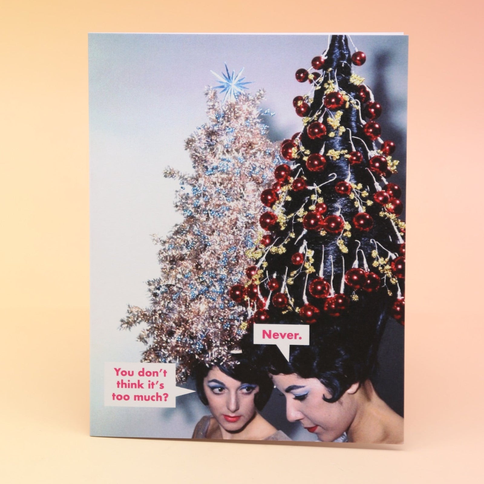 The Never. Christmas Card on a pink and yellow background.