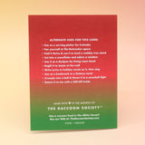 The back of the Death Metal Christmas Card on a pink and yellow background.