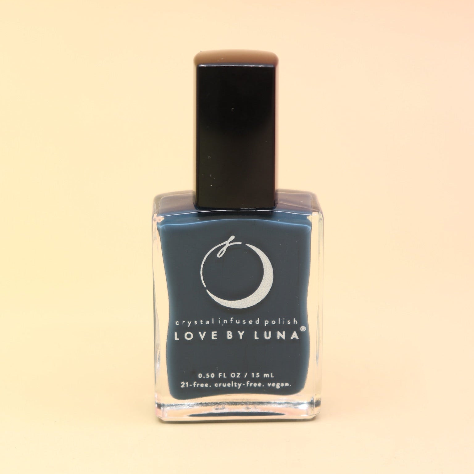 The Eternal Student Nail Polish on a pink and yellow background.