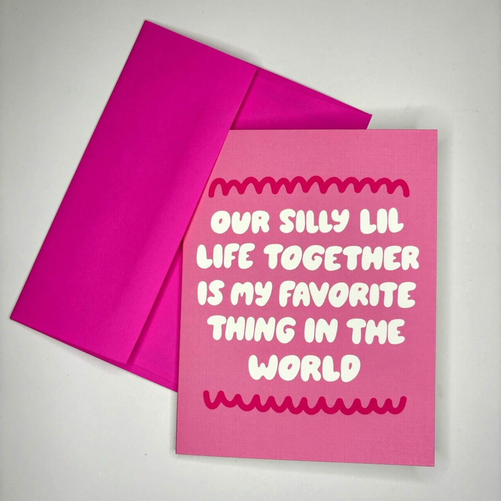 The Silly Little Life Love Card on a gray background.