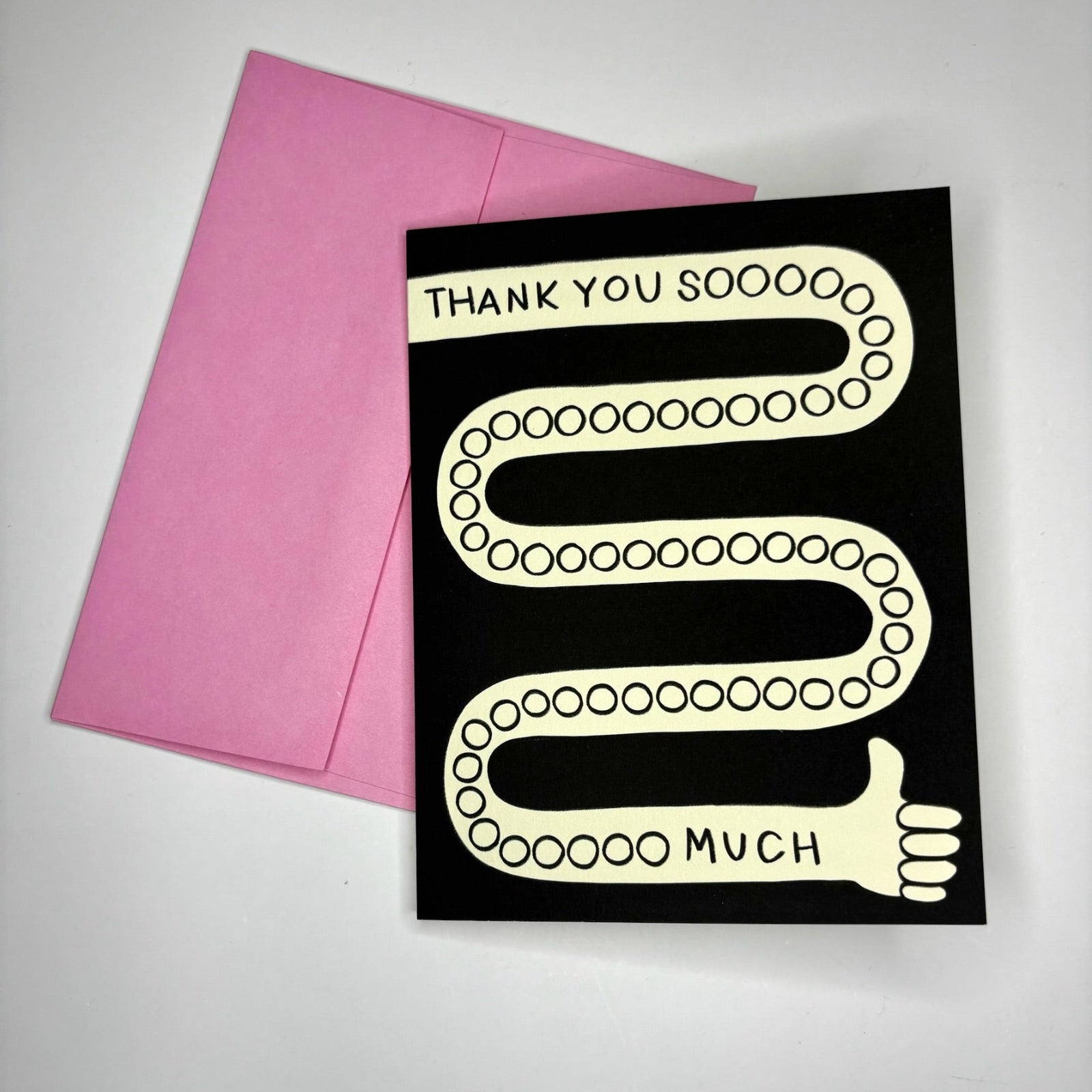 The Thanks Soooo Much Greeting Card on a gray background.