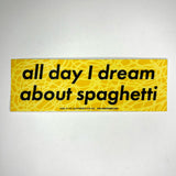 The All Day I Dream About Spaghetti Vinyl Bumper Sticker on a gray background.