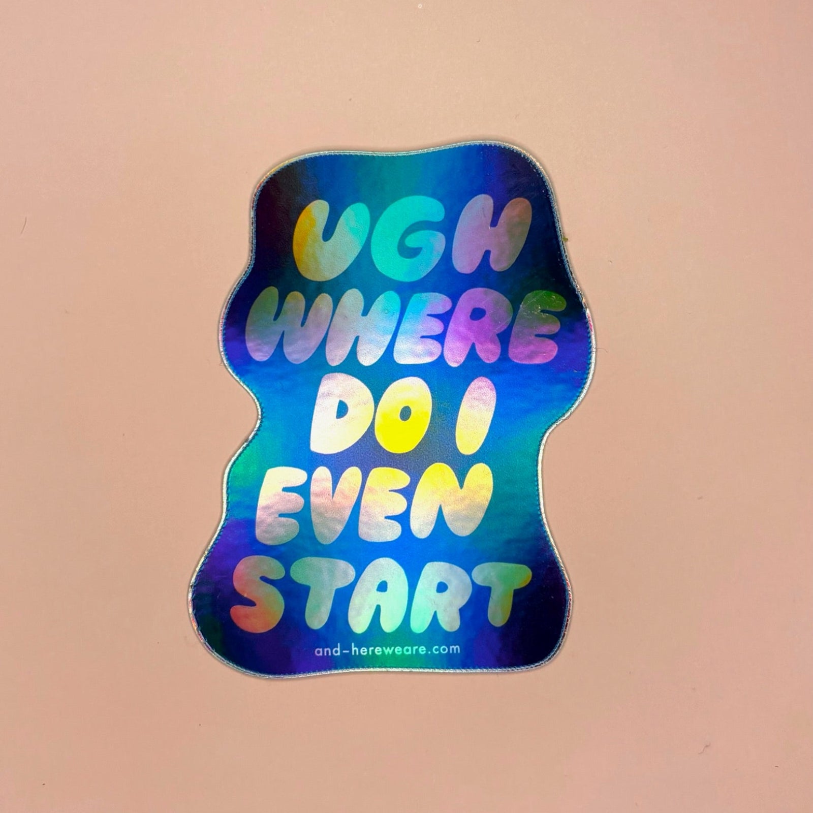 The Where Do I Even Start Holographic Vinyl Sticker on a peach colored background.