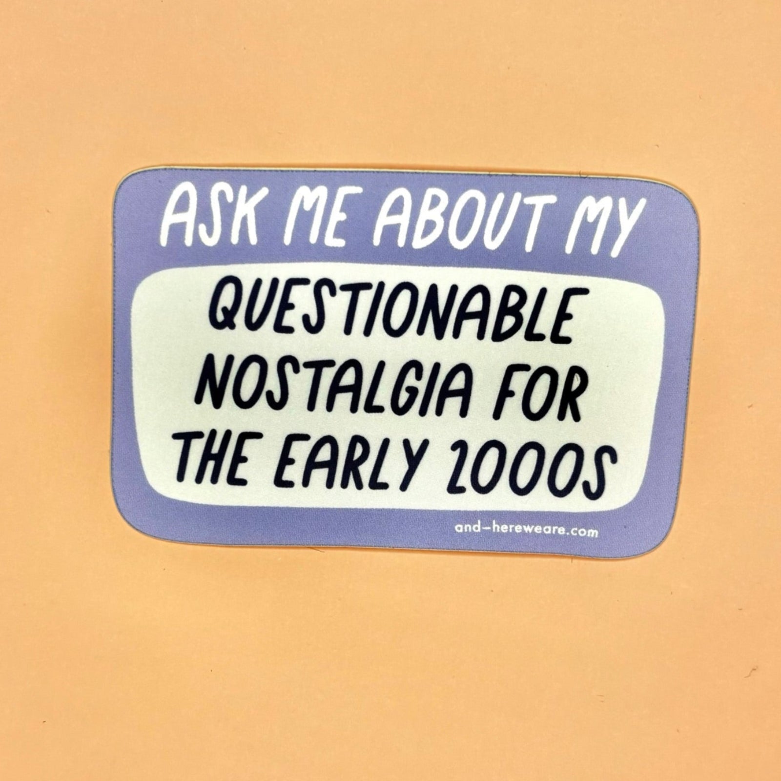The Early 2000s Nostalgia - Vinyl Sticker on an orange background.
